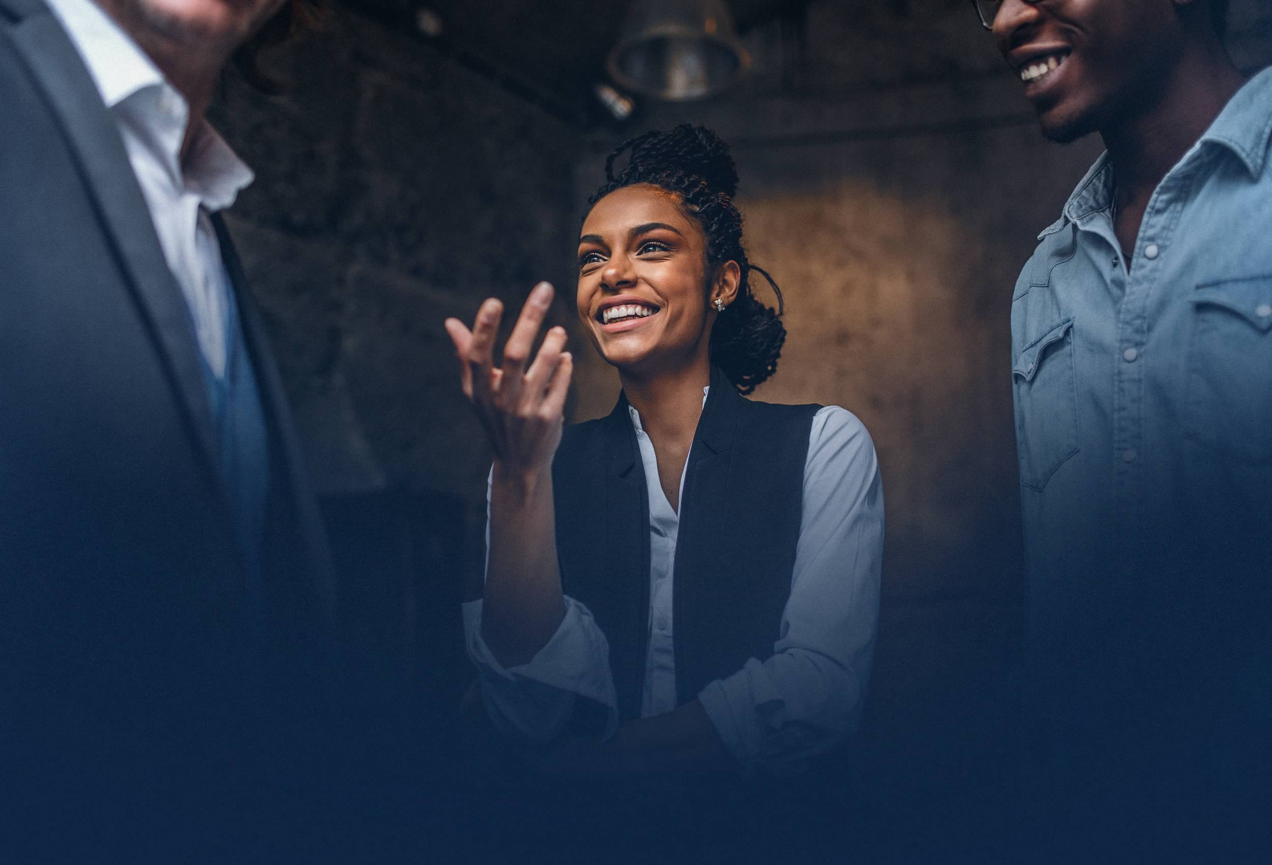 Business professional interacting with colleagues